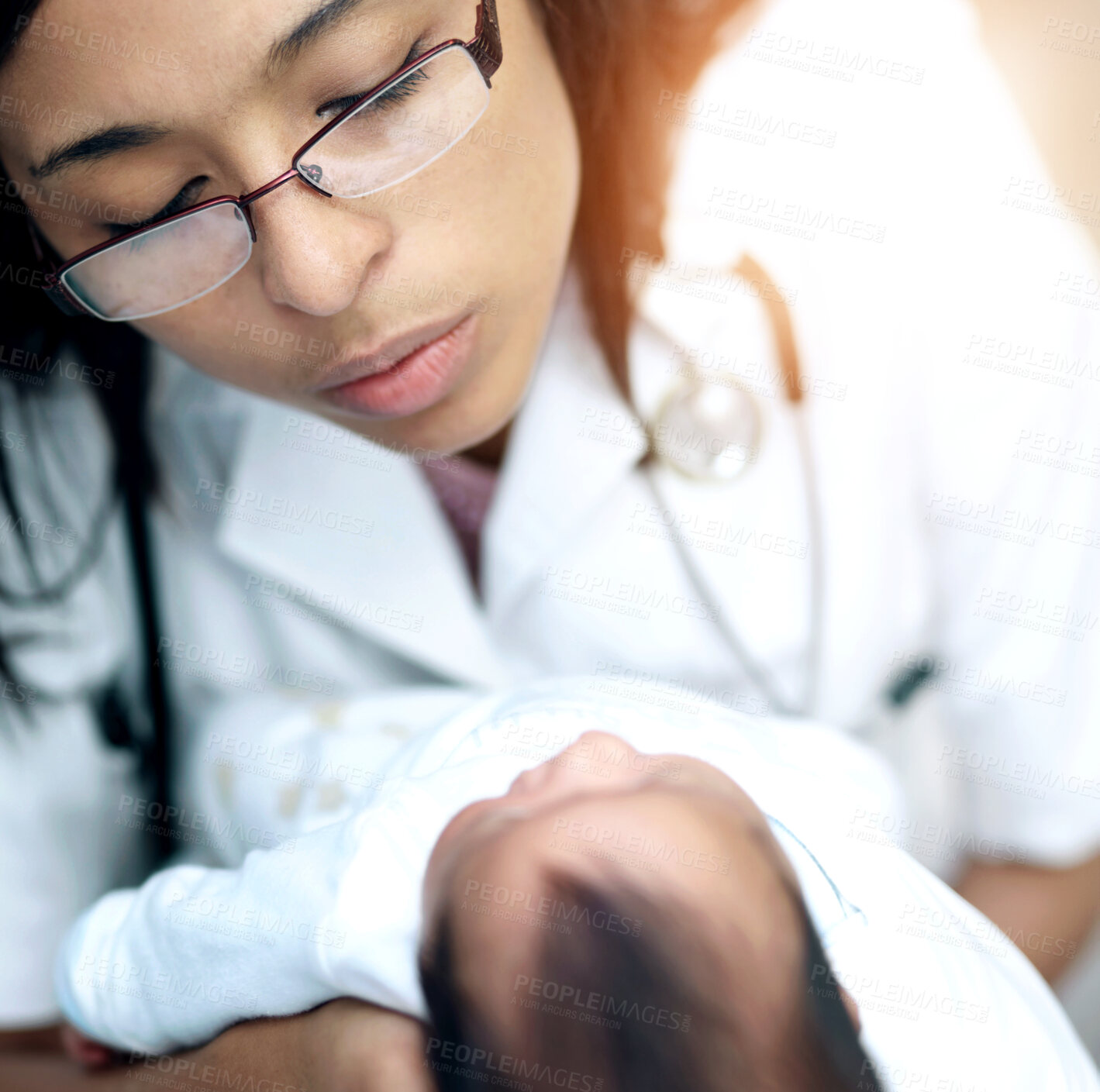 Buy stock photo Healthcare, medical and a pediatrician with a baby in the hospital for insurance, care or treatment. Medicine, children and a doctor woman holding a newborn infant in a health clinic for a checkup