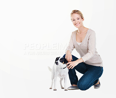 Buy stock photo A gorgeous young woman kneeling next to her Jack Russell