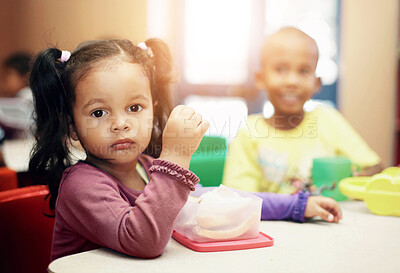 Buy stock photo Pre-school children on their lunch break eating sandwiches