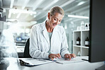 Keyboard, woman and scientist typing in laboratory for medical research on cancer drug trial. Smile, computer and mature female biology with clinical protocol development for pharmaceutical discovery