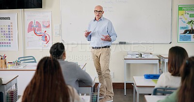 Buy stock photo Education, teacher and students in classroom, man and knowledge with assessment, explain or learning. Group, educator or youth with academy, biology info or test with intelligence or research project