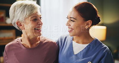 Buy stock photo Healthcare, smile and nurse with senior woman in assisted living for medical consultation. Happy, bonding and caregiver hug elderly female patient for kindness at wellness checkup in retirement home.