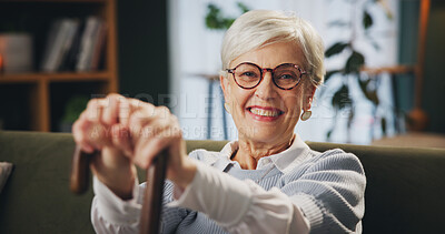 Buy stock photo Walking stick, portrait and senior woman with disability at home, arthritis and happiness in retirement. House, elderly lady and hands with wooden cane for balance, vertigo disease and osteoporosis