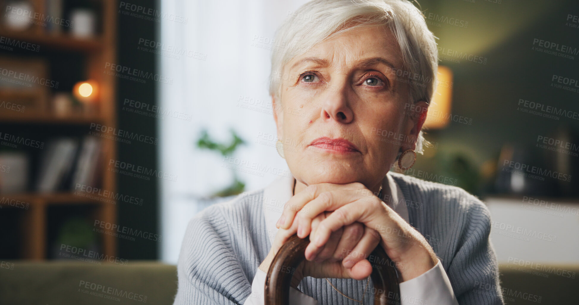 Buy stock photo Walking stick, memory and senior woman in home with thinking, remember or nostalgia for past. Dreaming, medical support and elderly female person with cane for dementia disease in retirement facility