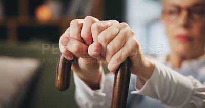 Buy stock photo Walking stick, hands and senior woman with disability at home, arthritis and depression in retirement. House, elderly lady and thinking with wooden cane for balance, vertigo disease and osteoporosis