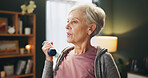 Senior woman, weightlifting and exercise with dumbbell in workout, power or strength at home. Elderly female person with light weights in lifting, warm up or fitness for training or practice at house