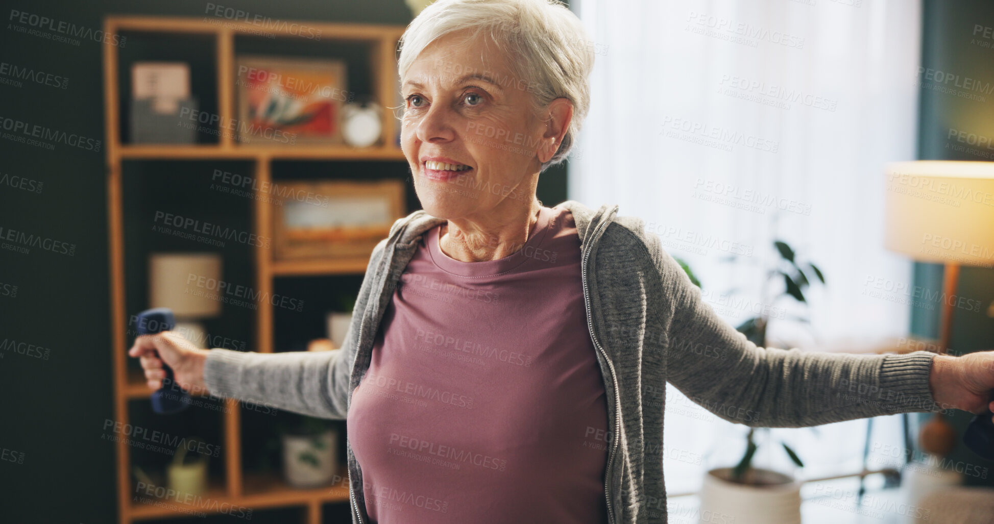 Buy stock photo Senior, happy woman and weightlifting with dumbbells in exercise, workout or strength at home. Elderly female person with smile or light weights for lifting, stretching or warm up in fitness at house