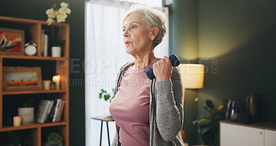 Buy stock photo Senior woman, weightlifting and arms with dumbbells in exercise, workout or strength at home. Elderly female person with light weights for lifting or warm up in fitness, practice or training at house