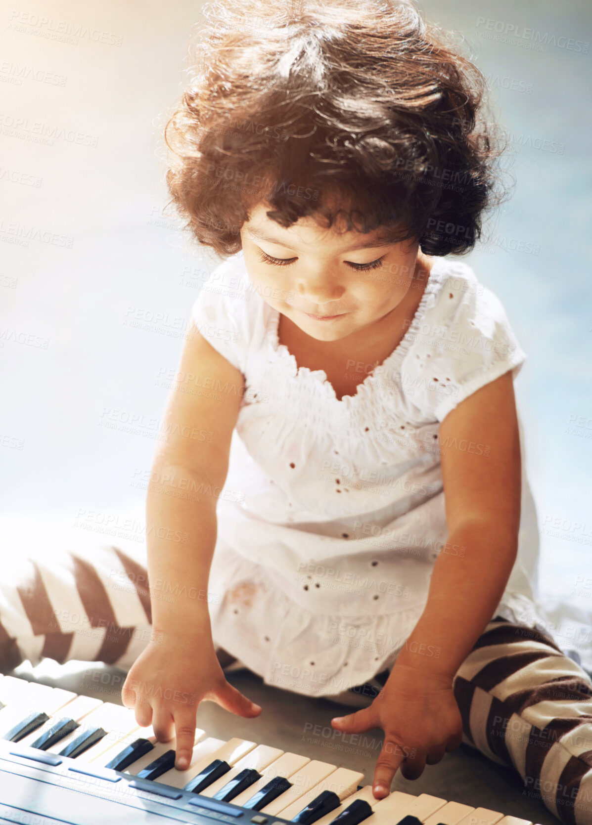 Buy stock photo Shot of a cute little girl at home