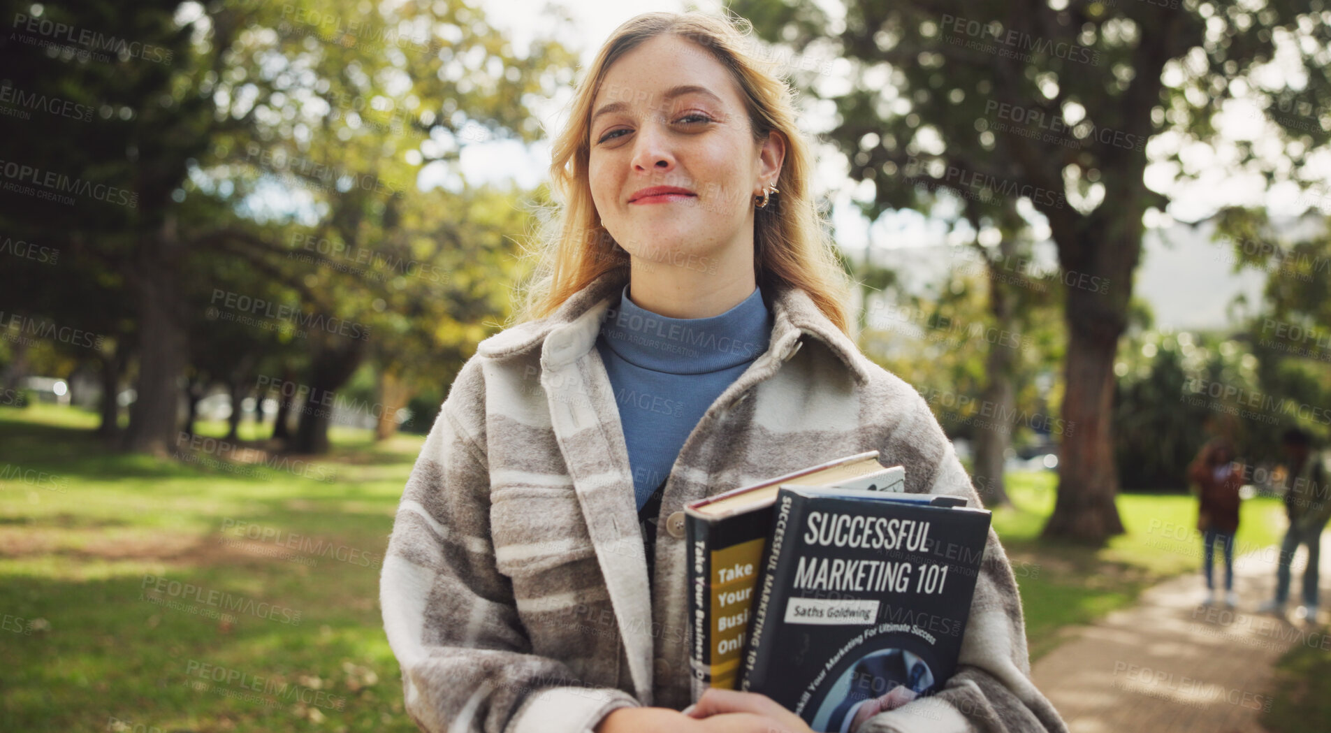 Buy stock photo Student, woman and books in park, smile and portrait on walk for education, learning and development at campus. Person, happy and outdoor on path in nature for scholarship at university in Germany