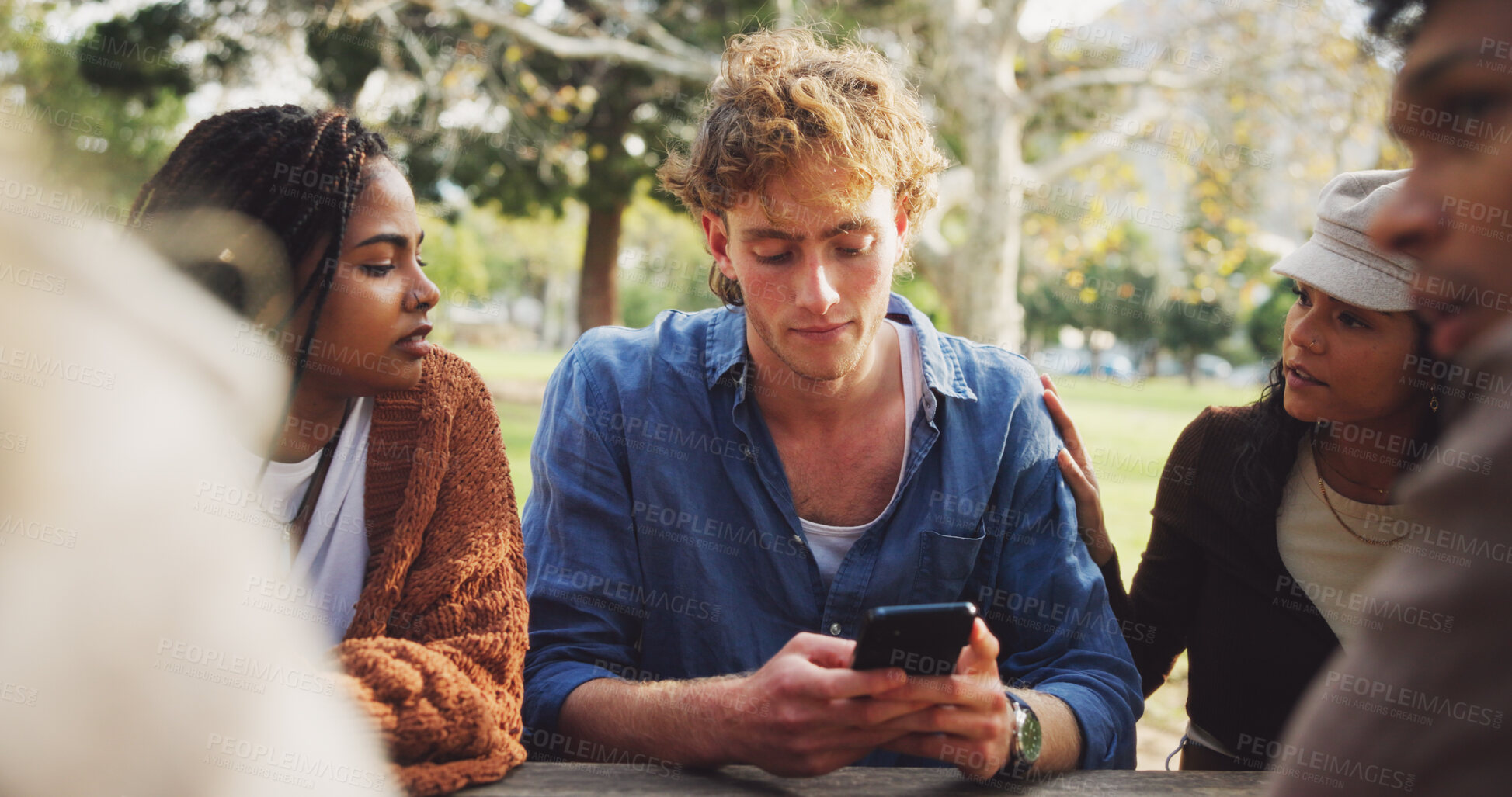 Buy stock photo Group, friend and support with phone outdoor on school break, discussion and reading bad news for comfort. People, students and relax with mobile for education results, fail test and care at campus