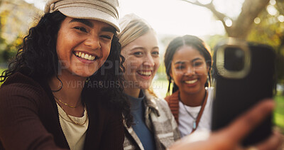 Buy stock photo Women, friends and selfie in park with smile, memory or together with diversity for post on social media. Girl, group and happy with photography, nature and outdoor in profile picture in Brazil