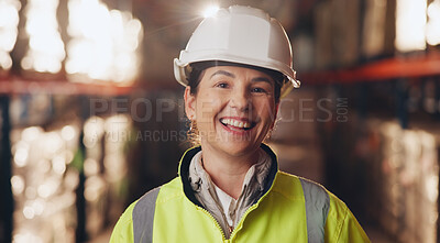 Buy stock photo Portrait, woman and smile in warehouse, confident and proud of supply chain in logistics and happy. Helmet, shipping and maintenance of production in factory, business and cheerful person or industry