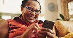 Senior, black woman and happy on sofa with smartphone for social media meme, browsing internet and comedy videos. Elderly person, laughing and relax in home with mobile for entertainment and text.