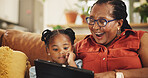 Happy, grandmother and child with tablet at house for streaming movie, bonding and video on social media. Surprise, black family and girl relax with digital for online ebook, comedy game and lounge