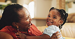 Happy, grandmother and holding child at house for bonding, love and care together of family support in lounge. Smile, senior black woman and girl with embrace for trust, connection and relationship