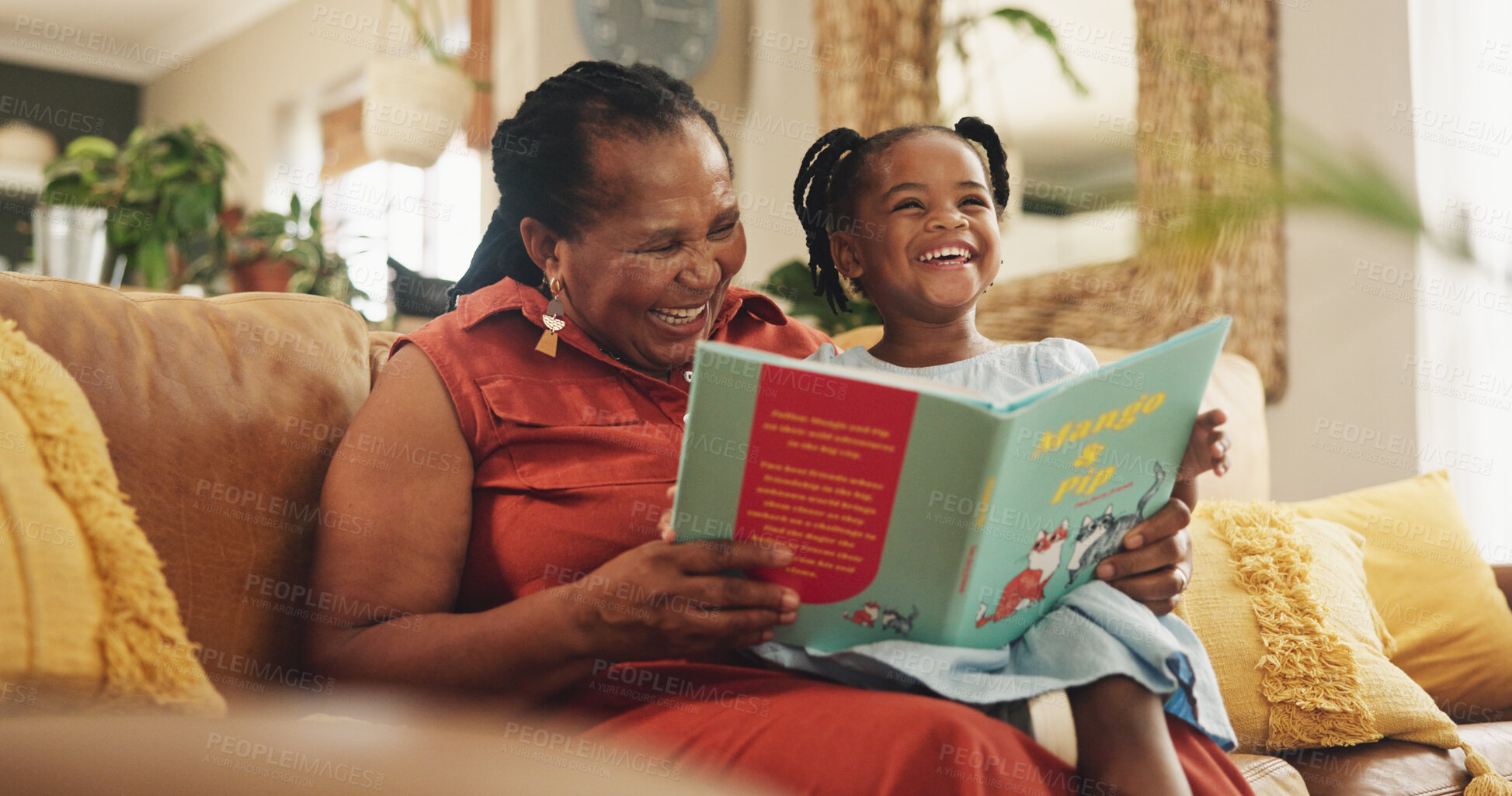 Buy stock photo Grandmother, child and laugh with book for education or smile, learning literature and fantasy storytelling. Black family,  reading and creative knowledge of support, language growth or care at house