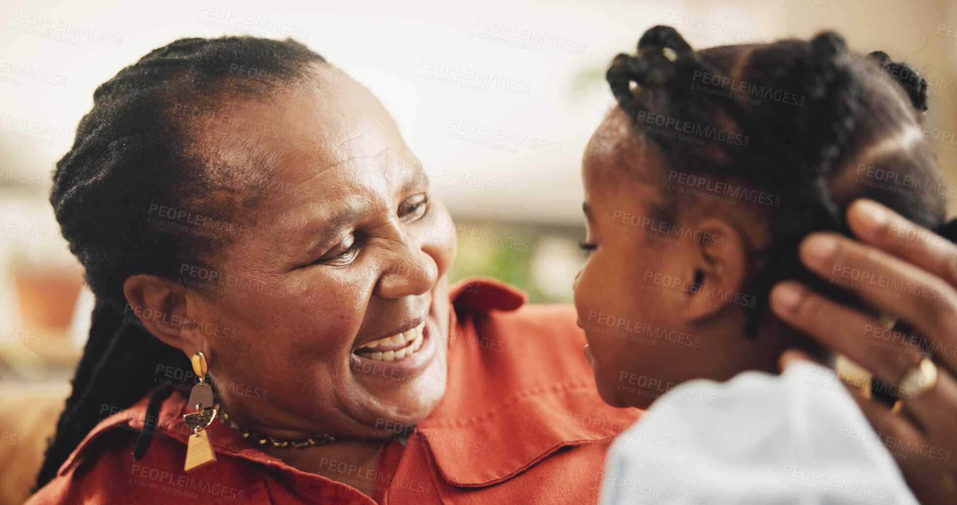 Buy stock photo Happy, senior and black woman with child at house for family bonding, affection and connection of care in lounge. Smile, grandmother and girl with embrace, love and relax together for childhood trust