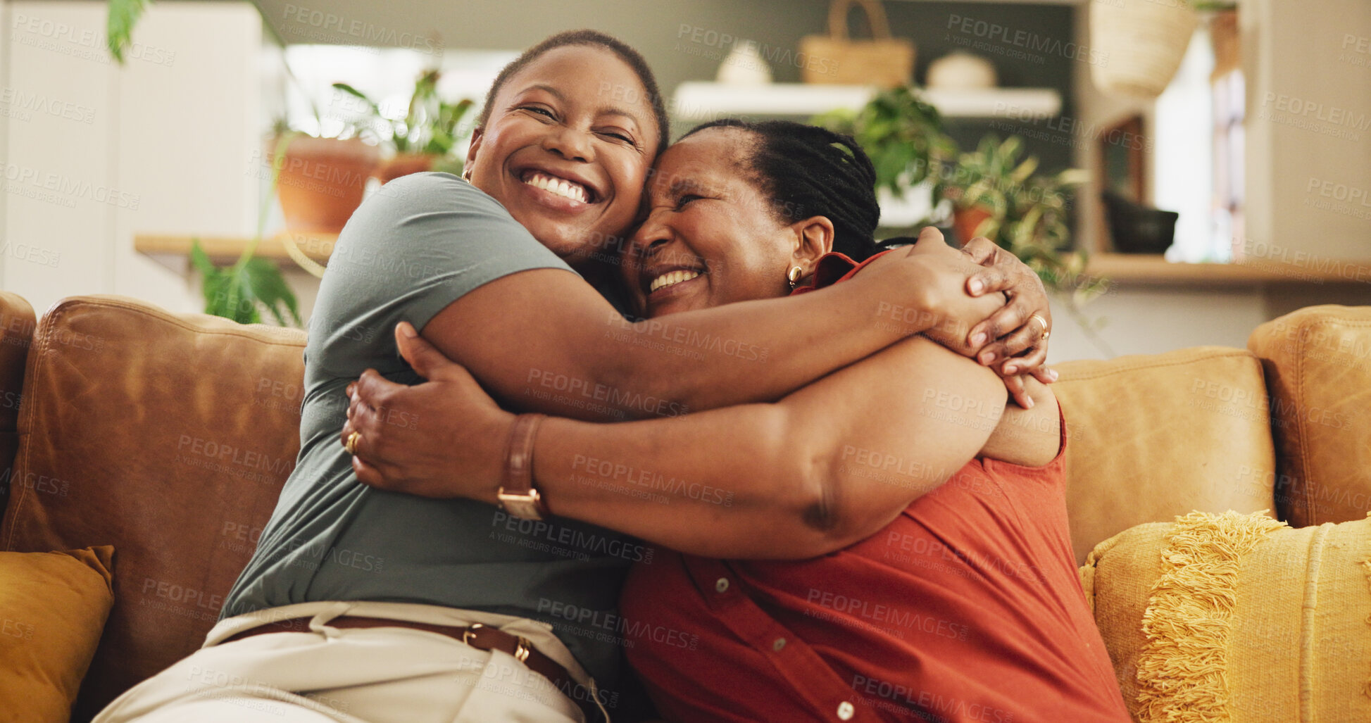 Buy stock photo Black family, excited and women on sofa for hug, love and support in living room. Senior mother, daughter and embrace at home for care, surprise visit and reunion on couch with happiness and trust