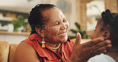 Buy stock photo Happy, grandmother and child with support at house for family bonding, affection and connection of care. Smile, senior and black woman with girl for embrace, love and relax together of childhood