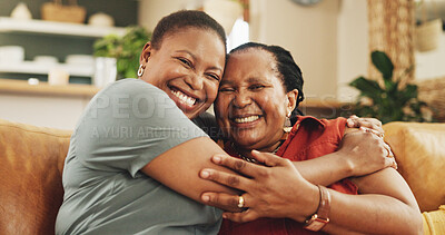 Buy stock photo Black family, portrait and women on sofa for hug, love or support in living room. Senior mother, daughter or embrace at home for announcement, surprise visit or reunion on couch with trust in Nigeria