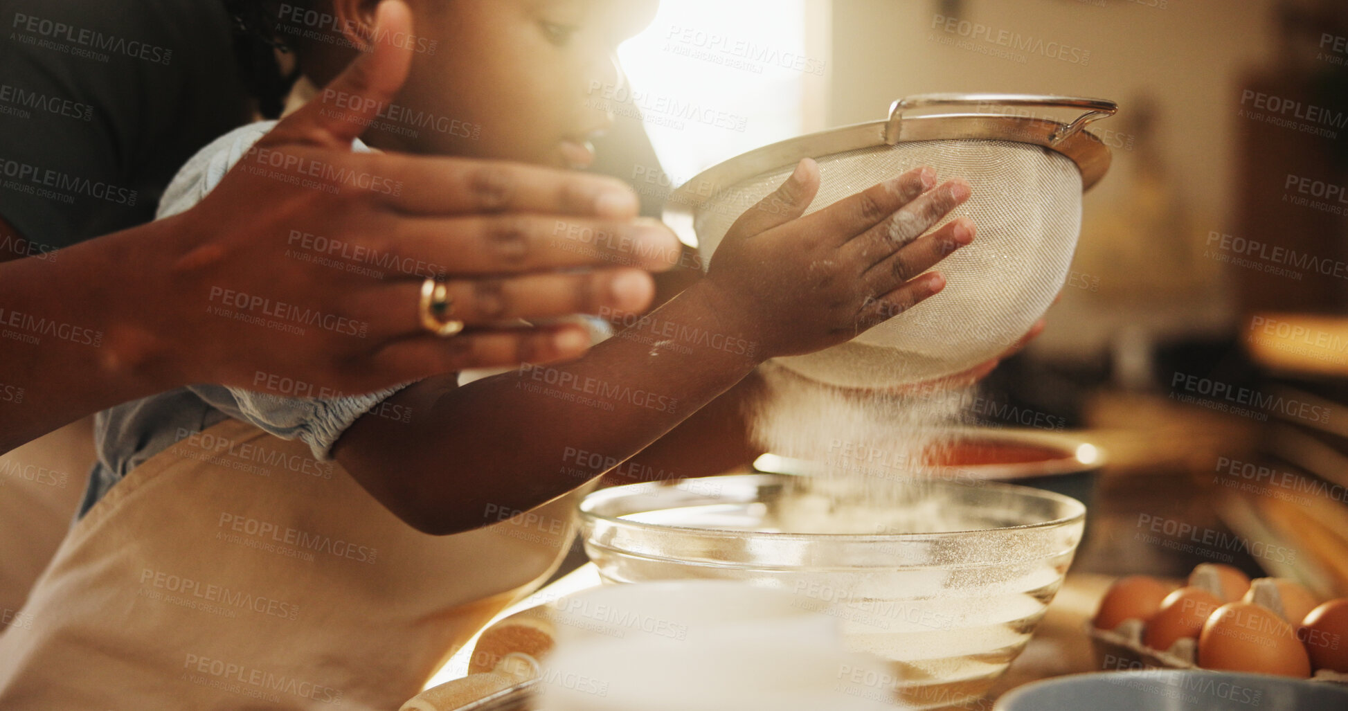 Buy stock photo Education, girl and hands in kitchen for baking, recipe or sifting organic flour at home. Child, development and mother at counter for growth, learning or fun activity for making dough for cookies