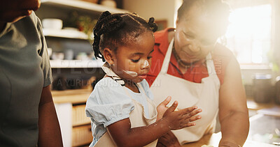 Buy stock photo Mother, daughter and teaching with baking, kitchen counter or motor skills in home for education or care. Black woman, kid and cooking for child development, growth and nutrition as family in bonding