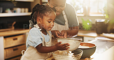 Buy stock photo Learning, child and black woman in kitchen for baking, recipe or cake ingredients at home. Girl, development and mother at counter for growth, teaching or fun activity for making dough for cookies