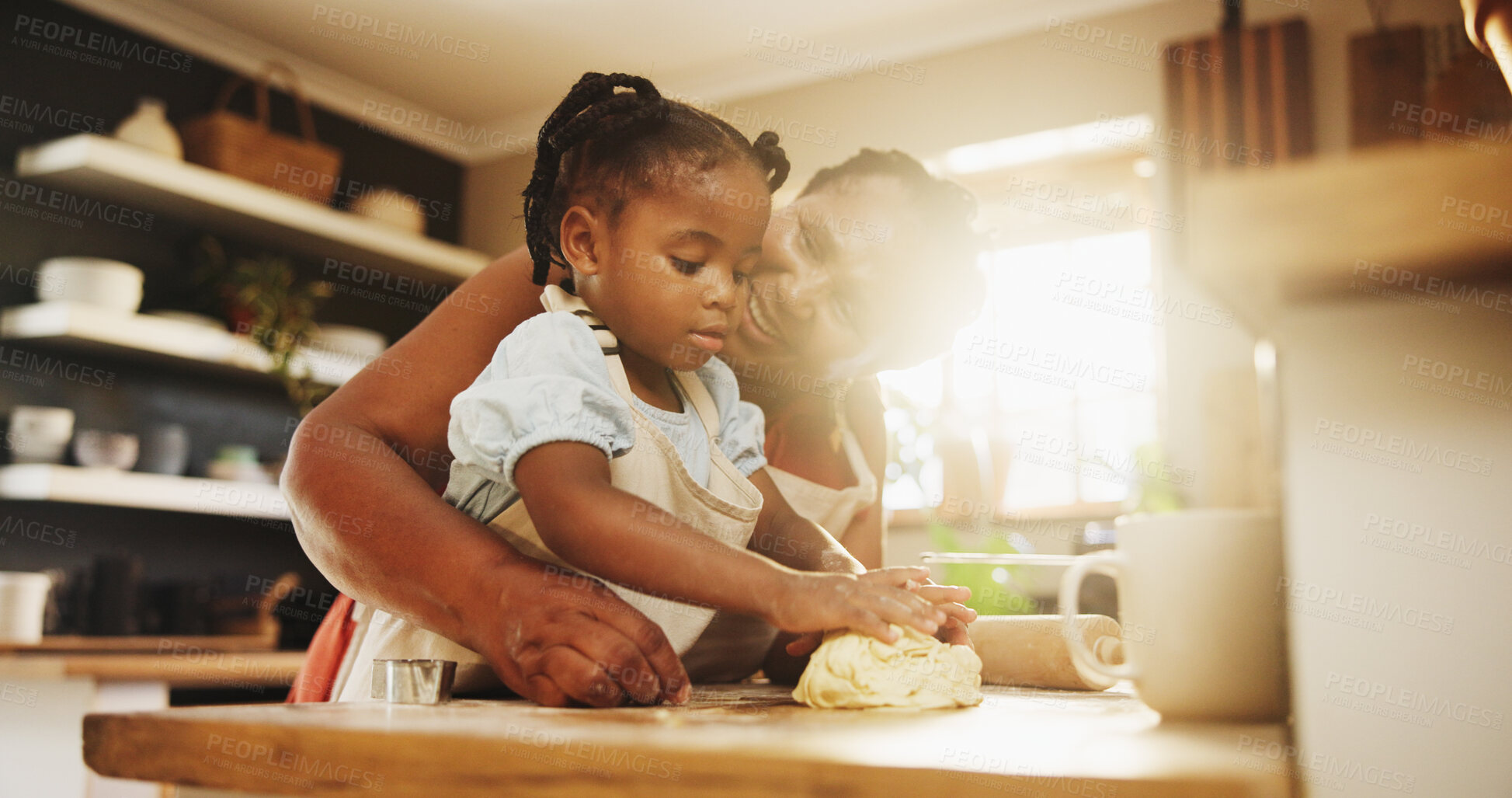 Buy stock photo African woman, child and teaching with cooking, skills and nutrition as parents in home for education. Mother, kid and learning for youth development, growth and kitchen counter as family in bonding