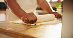 Baking, dough and hands with rolling pin in kitchen for cookies, biscuits or dessert preparation. Chef, cooking and closeup of person with pastry and utensil for dinner, snack or lunch at home.