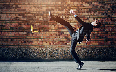 Buy stock photo Accident, slip and banana peel with a business man in the city, falling by mistake on a street.  Walking, step and unlucky with a young professional employee in an urban town for his commute to work