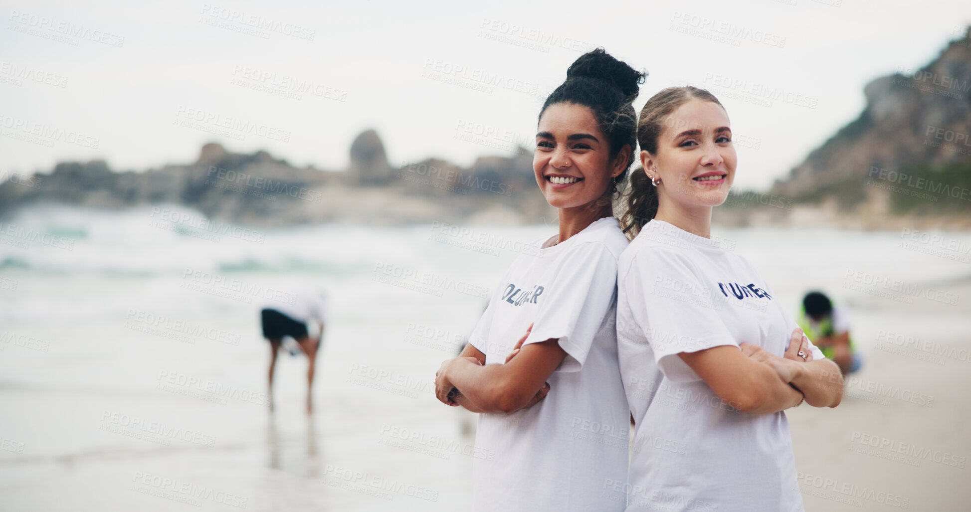 Buy stock photo Team, portrait and volunteer at beach for cleaning, recycling and environment sustainability with smile. Woman, ngo and crossed arms by ocean for community service, charity and cleanup collaboration