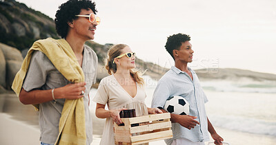 Buy stock photo Friends, smile and walking on beach for picnic with basket, beer and fun on travel vacation in summer. Men, girl and together by ocean with alcohol for drinking, conversation and bonding on holiday.