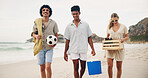 Friends, happy and walking on beach for picnic with basket, beer and fun on travel vacation in summer. Men, girl and together by ocean with alcohol for drinking, conversation and bonding on holiday.