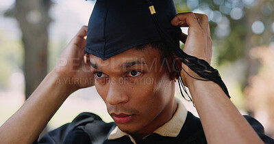 Buy stock photo Graduation, student and education for achievement, success and cap in university or college. Male person, pride and milestone for celebration, diploma or degree for career at ceremony on campus