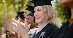 Education, woman and students clapping hands at graduation for academic milestone and achievement. University graduate, applause and happy at outdoor ceremony for success, college diploma and degree