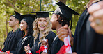 Group, graduation and students with education, achievement and knowledge with academic goals. Ceremony, outdoor and friends with diploma, certificate and degree with success, college and university