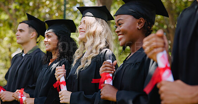 Buy stock photo Graduation, students and education with achievement, success and diversity in university or college. Group of people, happiness and milestone for celebration, diploma or degree for career at ceremony