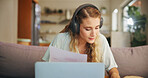 Woman, laptop and headphones with document at house for financial planning, review budget and streaming music. Girl, relax and digital with paperwork for mortgage payment, debt report and bank notice