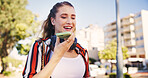 Woman, smile and phone for audio recording, conversation and mobile call with speaker or microphone. Female person, smartphone and walking in city for networking and technology with voice recognition