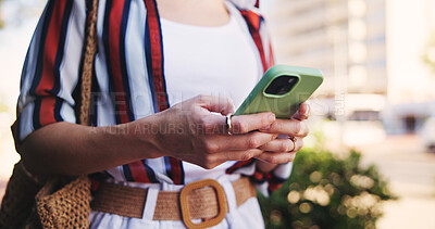 Buy stock photo Hands, phone and typing outdoor for social media, communication and travel while chatting with closeup. Female person, smartphone and walking in city for networking, email and mobile app with message