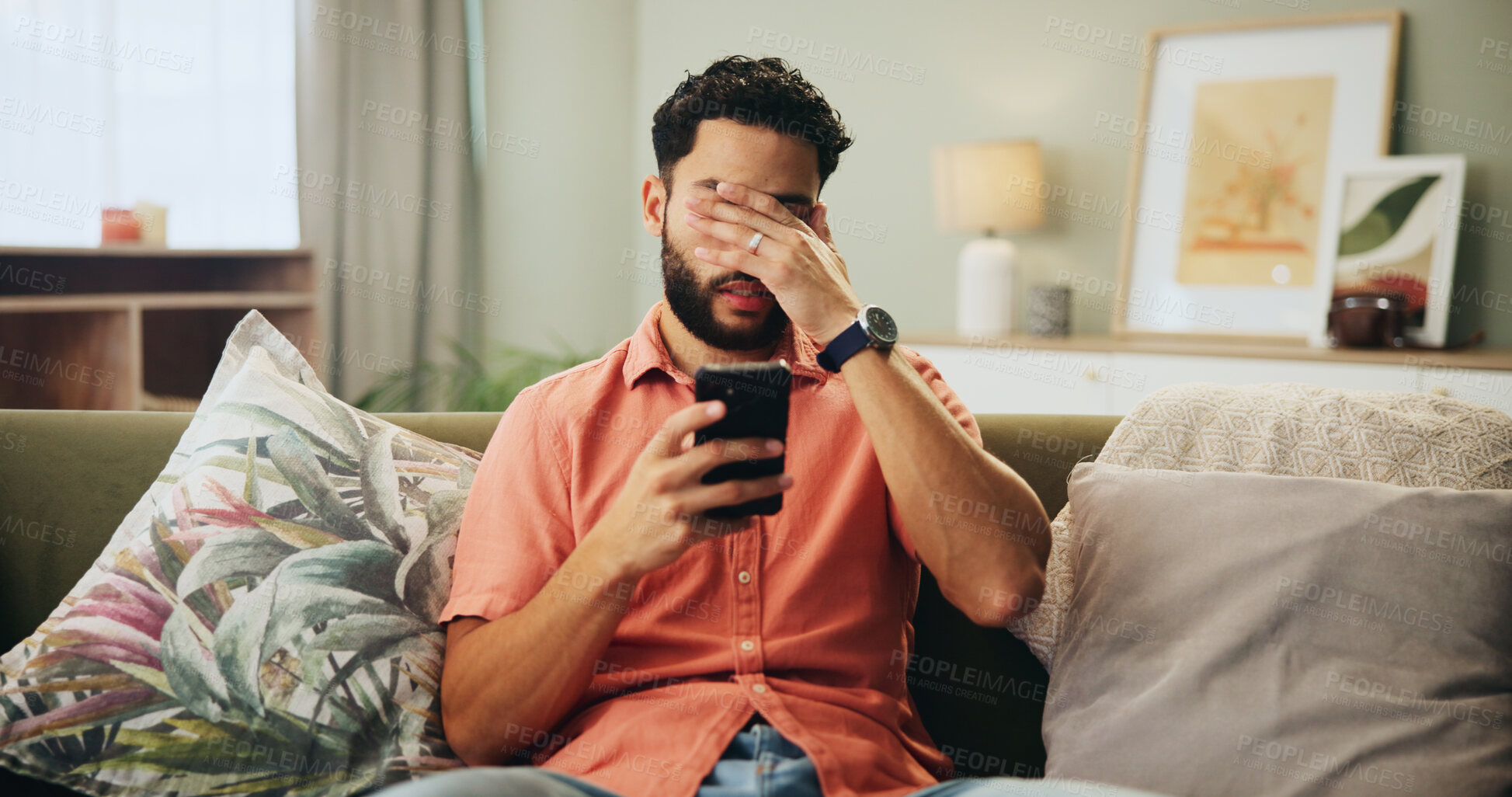 Buy stock photo Bad news, phone and stress with man on sofa in living room of home, reading text message notification. Annoyed, fail and mistake with frustrated person in apartment for missed appointment on calendar