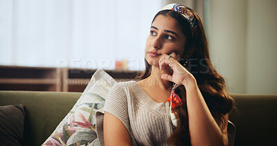 Buy stock photo Girl, relax and thinking or pensive on sofa for interior design planning, contemplating decor and decision. Female person, living room and thoughts or ideas for home styling and makeover inspiration.