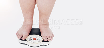 Buy stock photo A closeup shot of an overweight man weighing himself on a scale