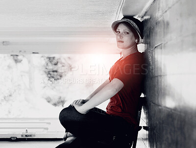 Buy stock photo A woman sitting on a chair inside her house with the house turned sideways - perspective