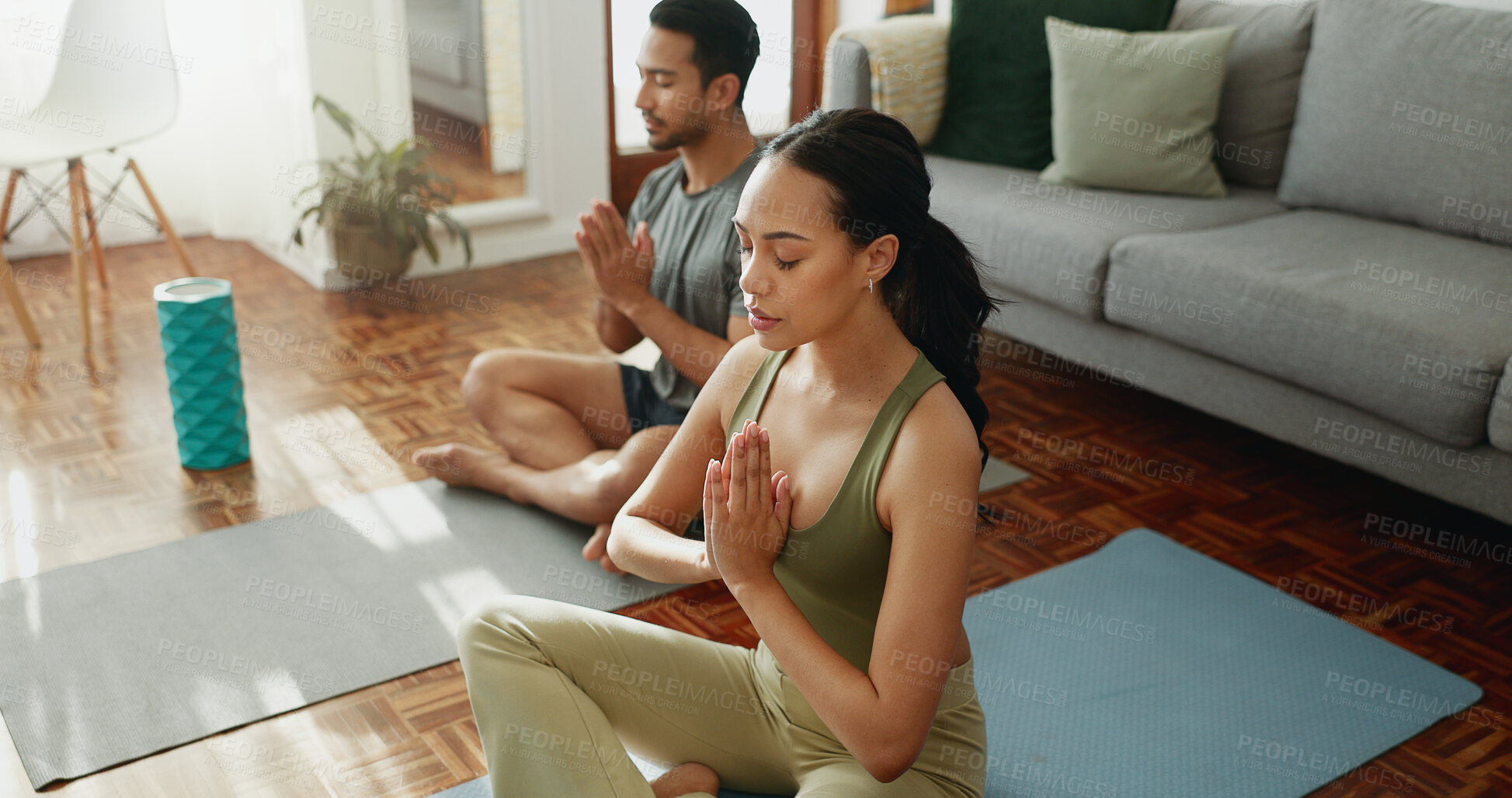 Buy stock photo Couple, yoga and namaste with meditation in home for holistic wellness, mindfulness and relax on mat with zen. People, praying hands and spiritual healing in living room for self care and peaceful