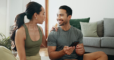 Buy stock photo Relax, phone and happy couple talking in home for social media, online shopping and payment. Man, woman and mobile in living room for conversation, account review and check credit score on internet