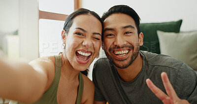 Buy stock photo Happy couple, fitness and portrait with peace sign for selfie, memory, or workout together at home. Young man and woman with smile or emoji for photography, picture or moment in health and wellness