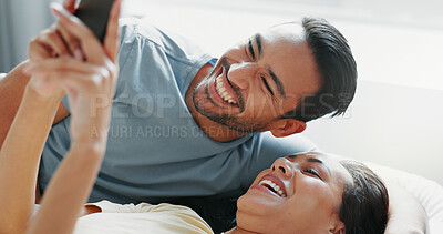 Buy stock photo Couple, happy and selfie on bed in home for profile picture update, social media post and memory. People, photography and bonding in bedroom with laughing, live streaming or relationship in apartment