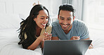 Laptop, love and smile with couple in bedroom of home to search for deal on accommodation or hotel booking. Relax, search or wellness with happy man and woman lying on bed together for bonding